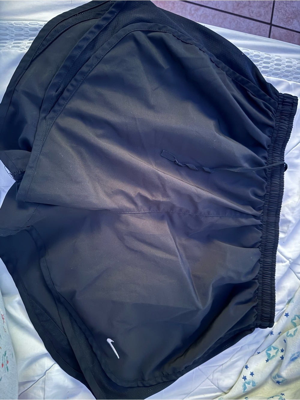 Nike Black Athletic Running Shorts with White Swoosh